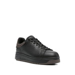 EMPORIO ARMANI EXCLUSIVE Lace-up low-top sneakers in black leather with ribbed panel and flat rubber sole.