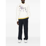 Man wearing EMPORIO ARMANI EXCLUSIVE Sweaters White, featuring a classic hood, front pouch pocket, and printed design.