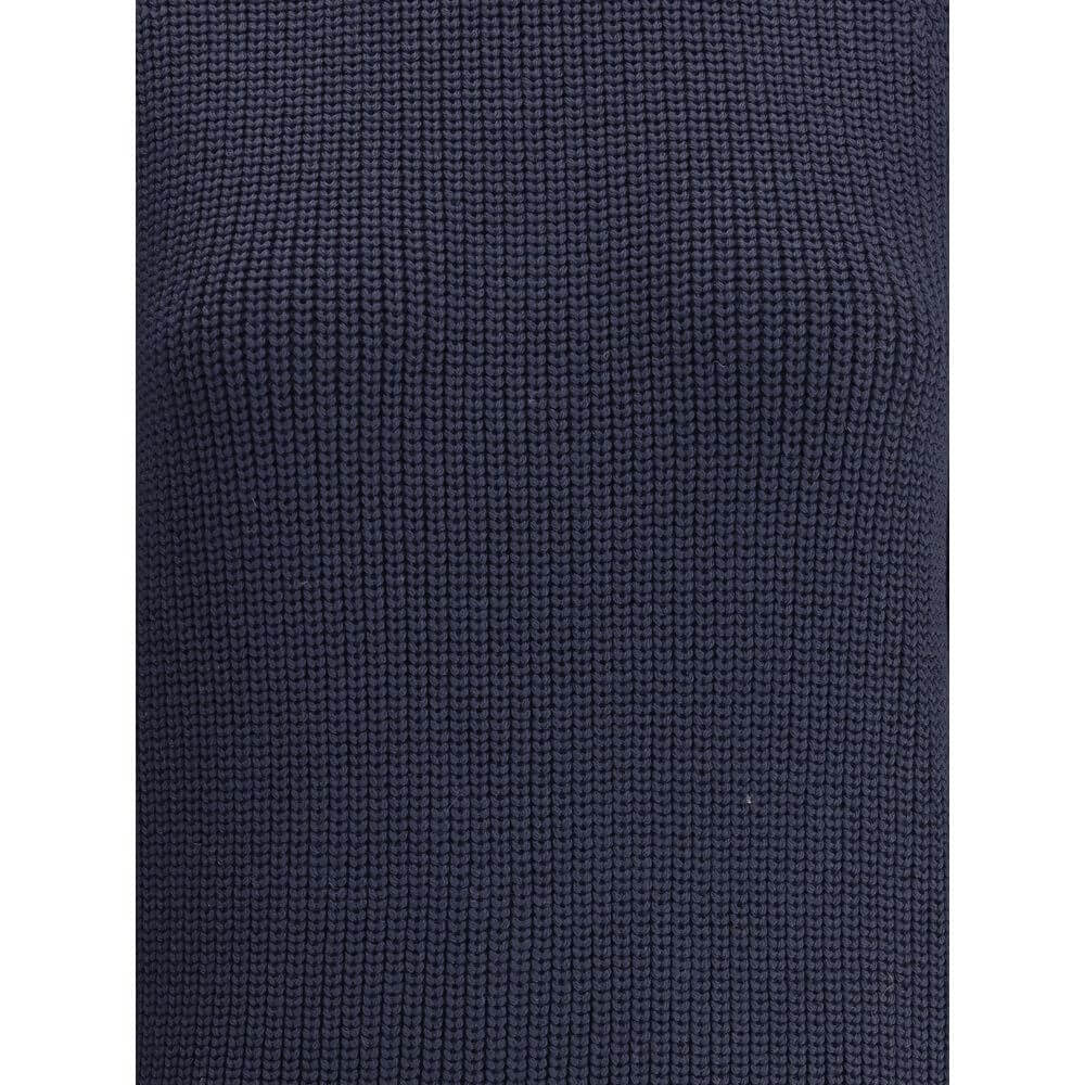 Close-up of the chunky knit texture of the Ella Blue Merino Wool Sweater, showcasing its rich color and warm, cozy style.