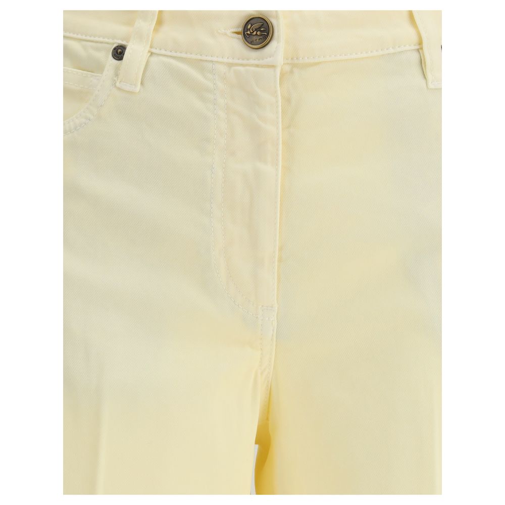 Close-up of Etro Yellow Cotton Straight-Leg Jeans with button and zipper closure.