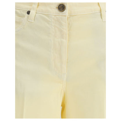 Close-up of Etro Yellow Cotton Straight-Leg Jeans with button and zipper closure.