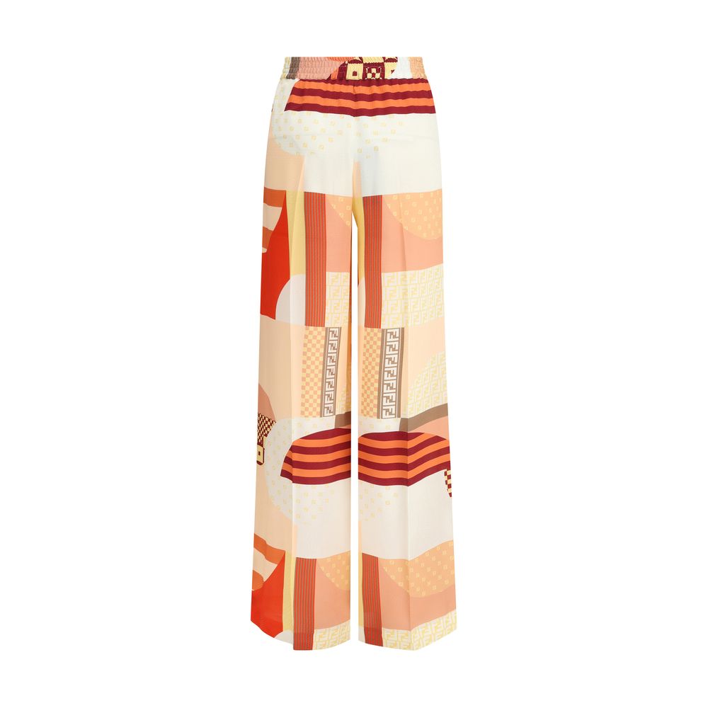 Fendi Multicolor Silk Casual Pants with patchwork print, elastic waist, and ironed pleats for elegant and comfortable fit.