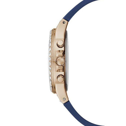 Side view of GUESS Mod. GW0257L3 watch with blue strap and rose gold-tone case featuring quartz movement and mineral dial, 3 ATM water resistant.