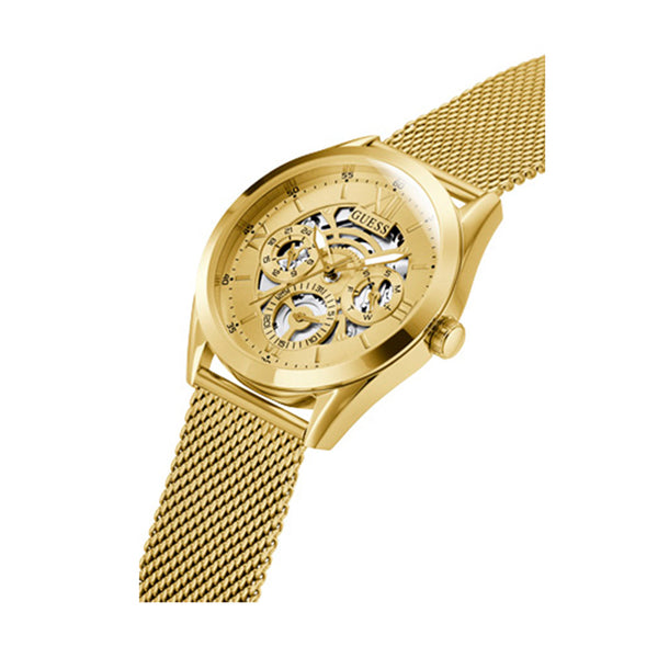 Gold watch with mesh strap, openwork dial from GUESS Mod. TAILOR collection, showing intricate interior mechanics and style.