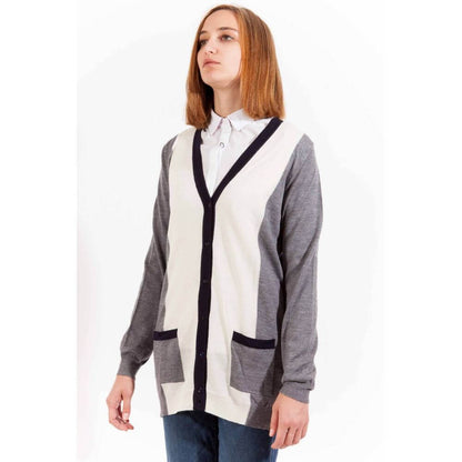 Woman wearing Gant Gray Wool Sweater, long sleeve cardigan with buttons and 2 pockets, featuring logo detailing.