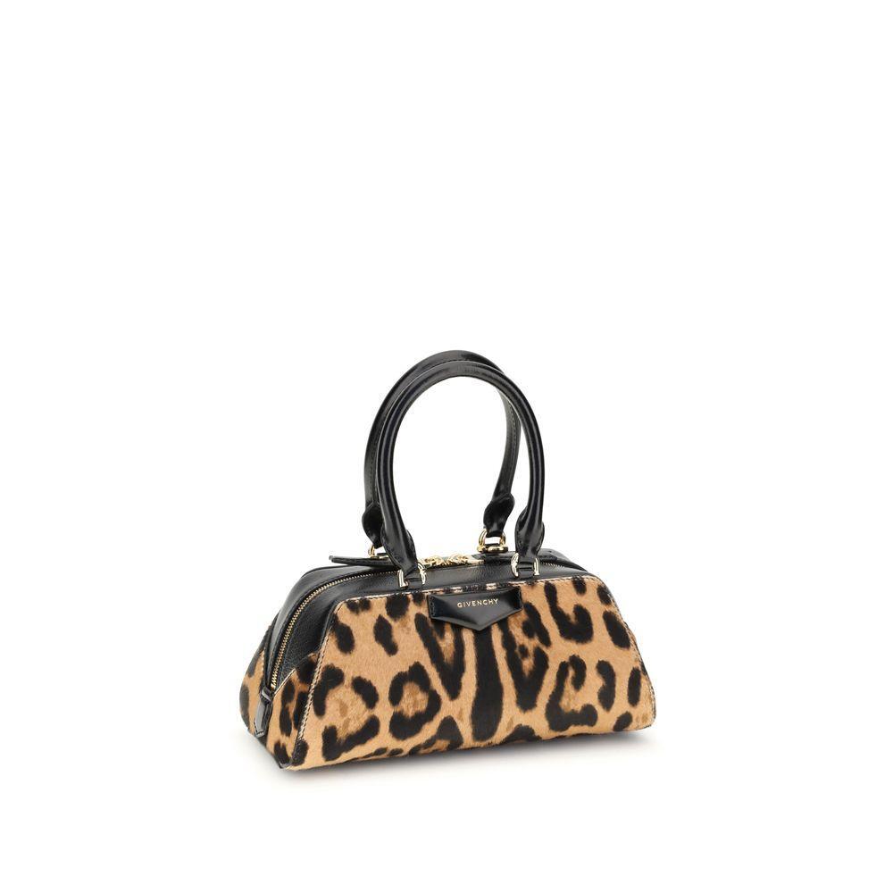 Front view with bag zipped and handles upright.