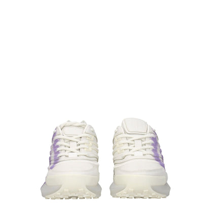 Givenchy Beige Leather Low Top Sneakers with lilac side detail and rubber sole, branded front and back, round toe, lace-up closure.