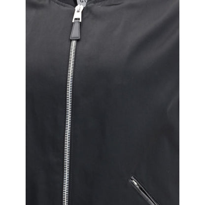 Close-up of Givenchy Black Cotton Bomber with satin body and leather detailing, featuring zipper closure.