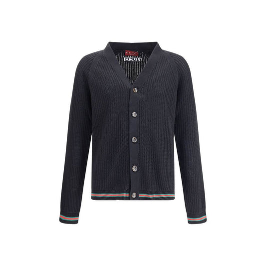 Gucci Black Cotton Cardigan with V-neck front and button closure, featuring raglan sleeves and ribbed cuffs for a refined, comfortable fit.