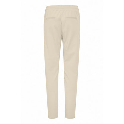 Back view of ICHI Beige Polyester Pants featuring elastic waistband and slim fit design.