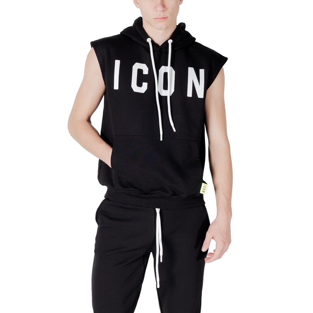 Man wearing Icon Black Cotton Hoodie with 'ICON' logo, adjustable hood, front pocket, trendy casual style.