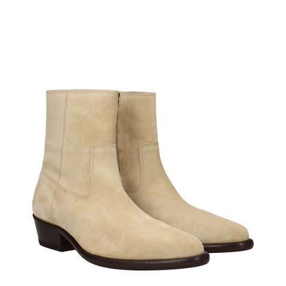 Alt Tag: Isabel Marant Beige Leather Ankle Boots with suede finish and mid heels, showcasing pointy toe design with a zip closure.