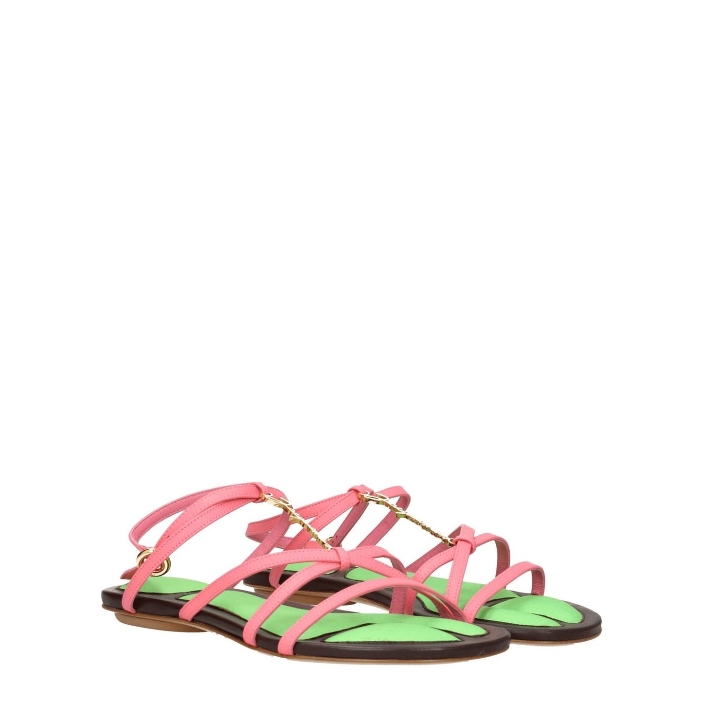 Jacquemus Pink Leather Flat Sandals with buckle closure, gold accents, and open toe design on green backdrop.