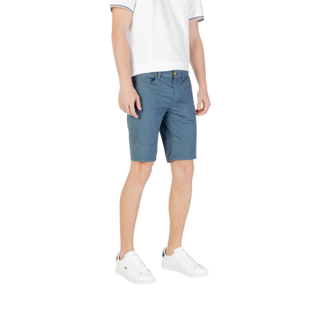 Model wearing Jeckerson Blue Cotton Bermuda Shorts with white sneakers and t-shirt, highlighting summer style and comfort.