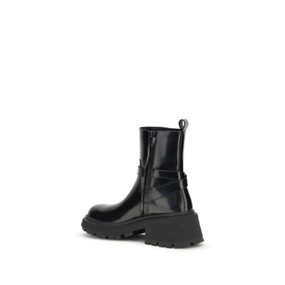Jimmy Choo Black Calf Leather Bos Taurus Ankle Boots with lugged sole and adjustable buckle, rear view