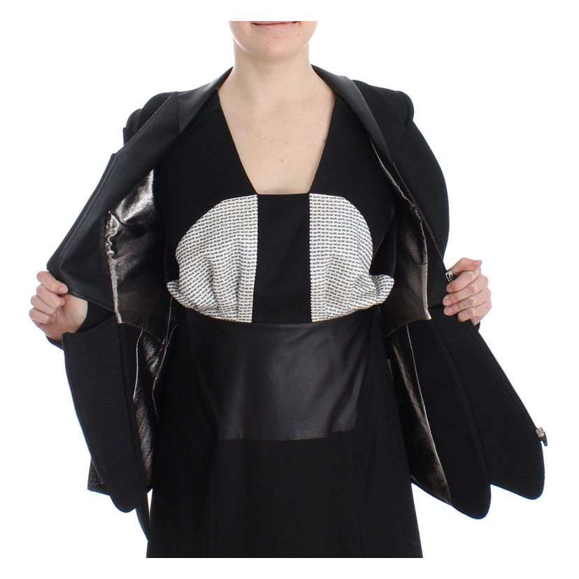 Model wearing KAALE SUKTAE Black Short Blazer Coat Biker Jacket with open front showcasing elegant design details.