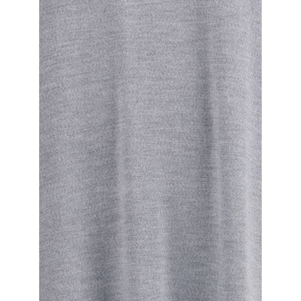 Close-up of the fabric texture of Khaite Gray Wool Casual Dress in medium-weight merino wool, showcasing its refined quality.