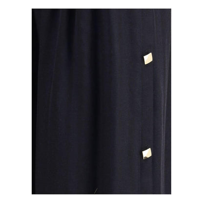 Close-up of Kristina Ti Black Fleece Wool Long Skirt with golden geometric buttons, showcasing elegant design and detailed craftsmanship.