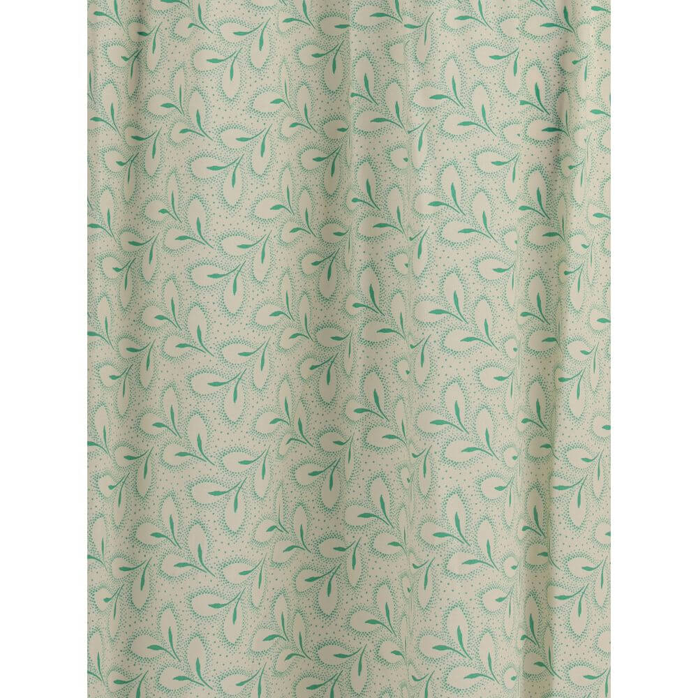 Detail of Kristina Ti Green Silk Long Dress with delicate foliage print and fluid fabric design.
