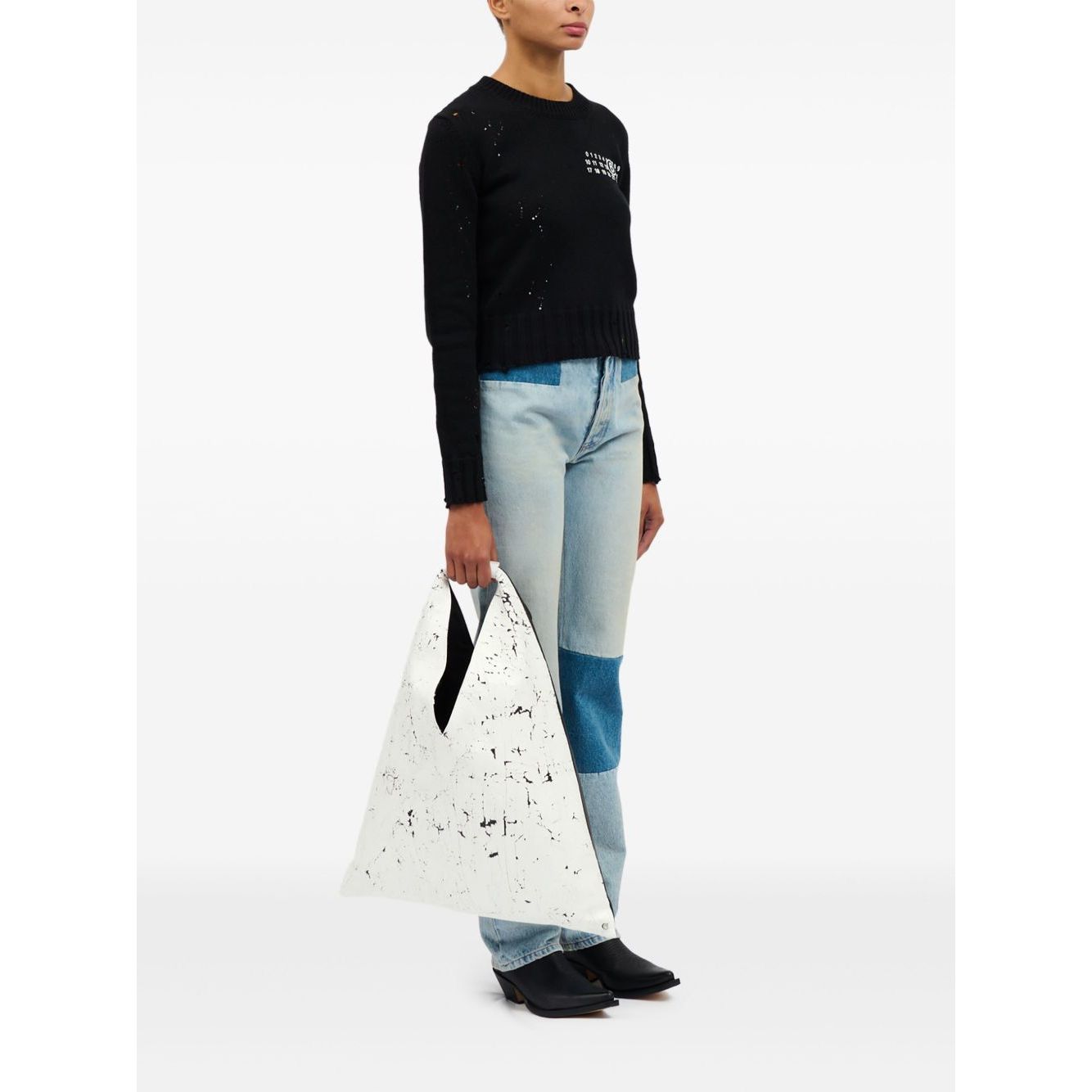 Front view with bag zipped and handles upright.