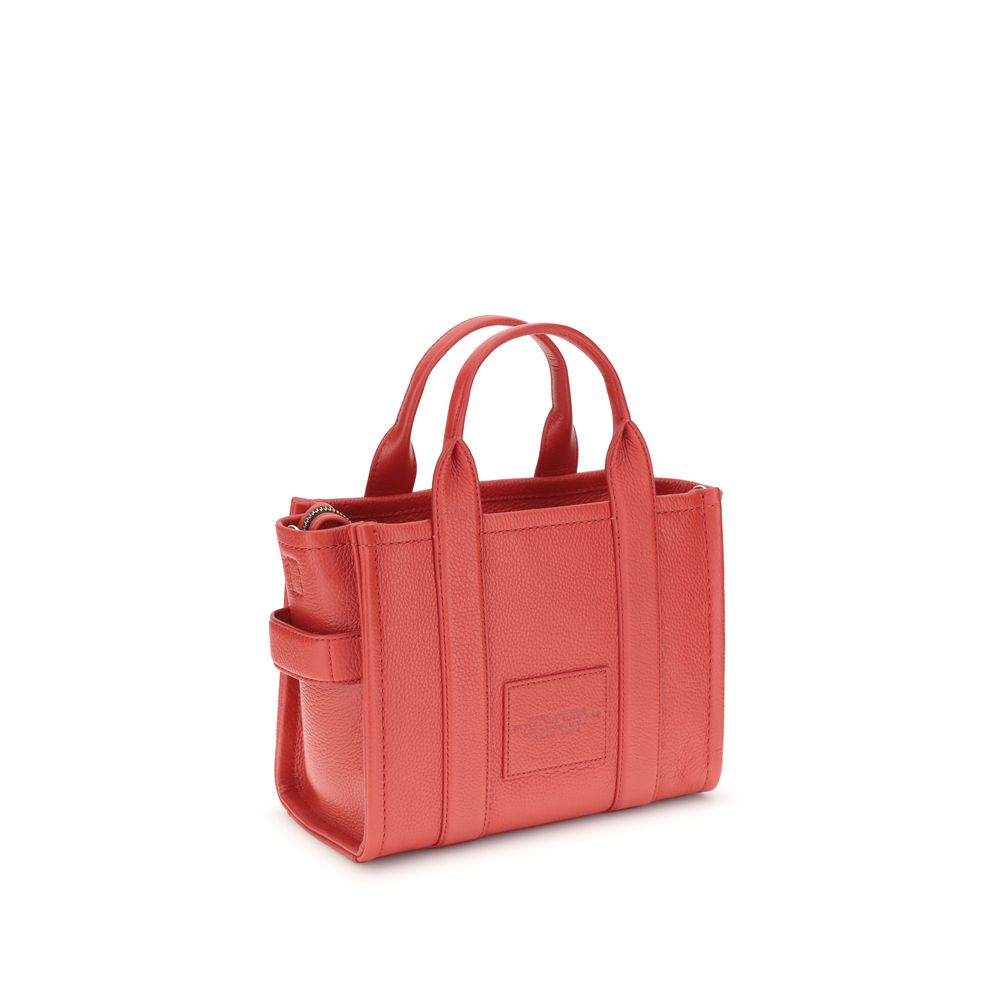 Marc Jacobs Red Calf Leather Bos Taurus Handbag with top handles and shoulder strap, made of grained leather and zippered closure for security.