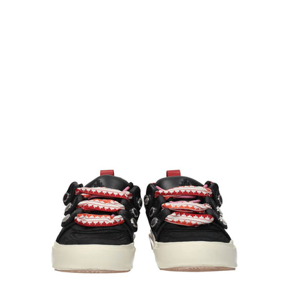 Front view of Marcelo Burlon Black Leather Low Top Sneakers with red details, aged effect, and lace up closure.