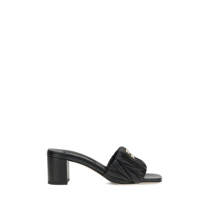 Miu Miu Black Lamb Ovis Aries Aries Stiletto Heel Sandals with squared toe and padded straps featuring Miu Miu monogram plaque.