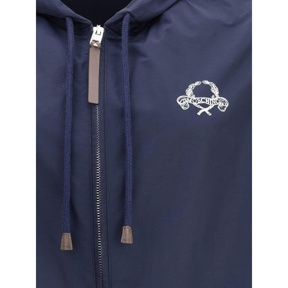 Close-up of Moschino Blue Polyester Shell Jacket showing logo embroidery and zipper design details.