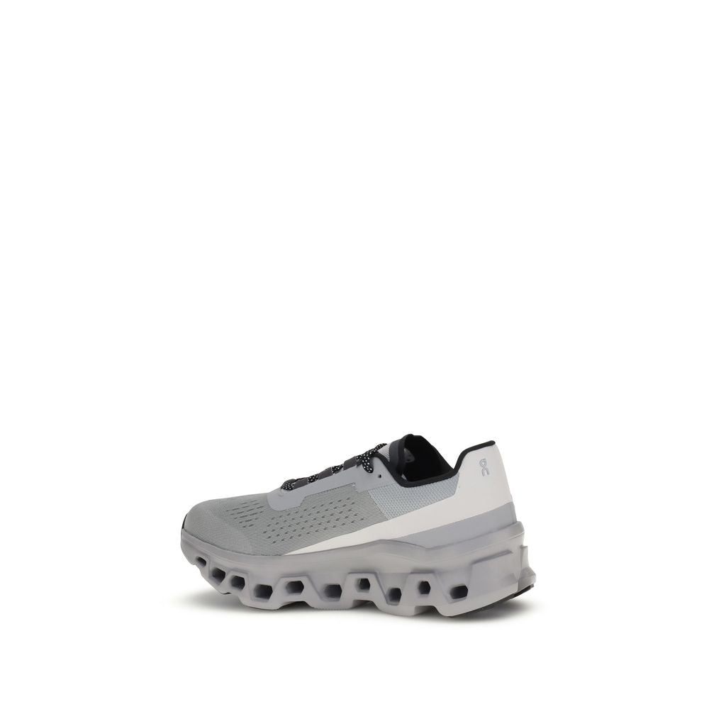 ON Gray Polyester Athletic Sneakers with raised perforated sole for cushioning and support, featuring logo and lace-up closure for secure fit.