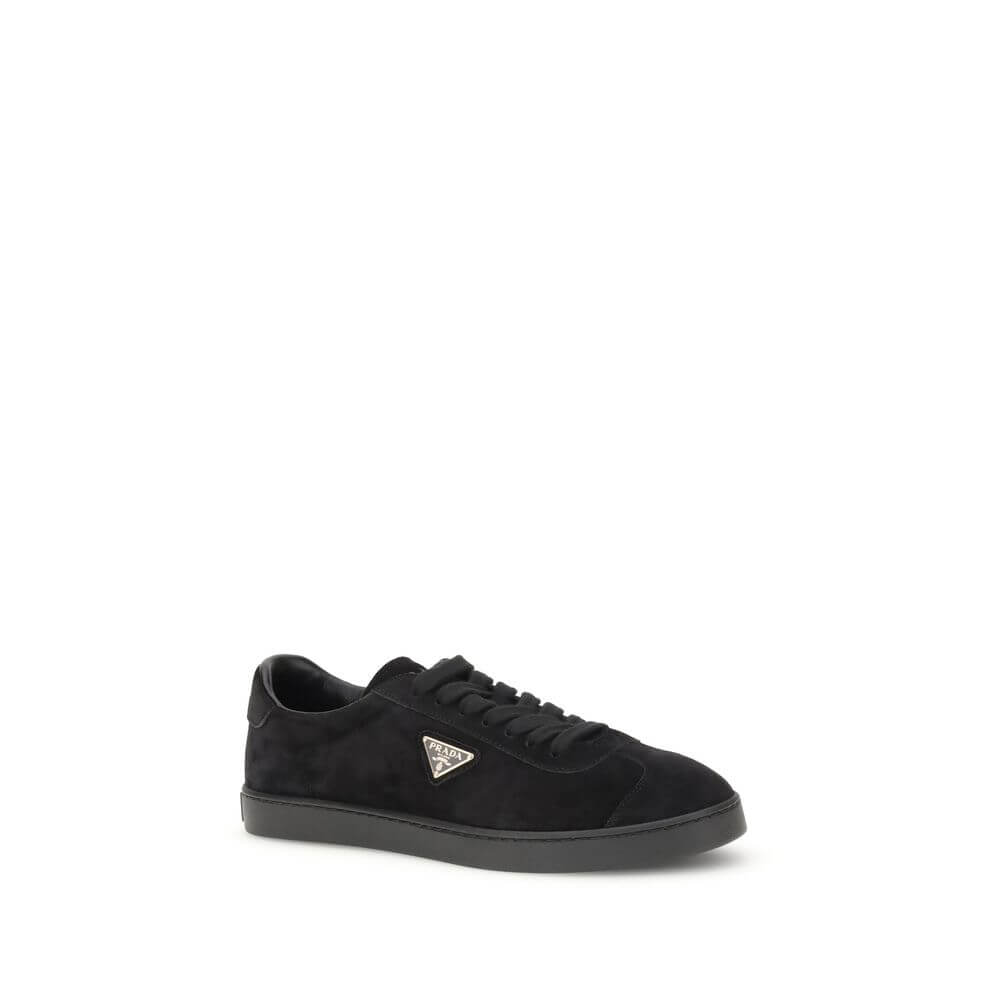 Prada Black Calf Leather Bos Taurus Low Top Sneakers with rubber sole and iconic triangular plaque.