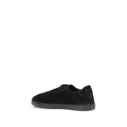 Prada Black Calf Leather Bos Taurus Low Top Sneakers with rubber sole and triangular side plaque.