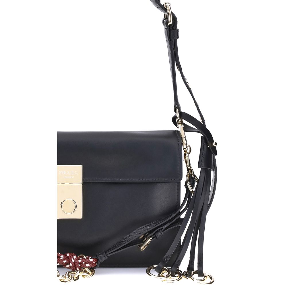 Prada Black Calf Leather Bos Taurus Shoulder Bag with metallic logo detail and adjustable leather strap.
