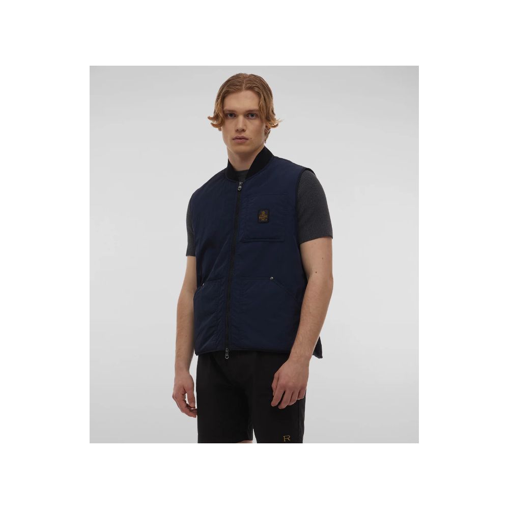 Refrigiwear Blue Polyamide Men Vest featuring sleek zipper closure and multiple pockets, worn by a male model against a gray background.