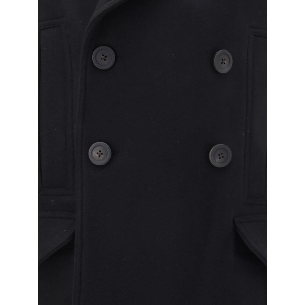 Close-up of Rick Owens Black Fleece Wool Coat with wide lapels, double-breasted button closure, and front welt pockets.