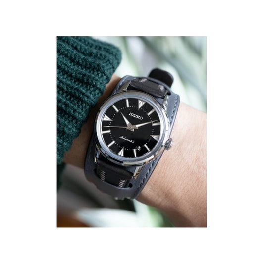 SEIKO PROSPEX Mod. 1959 ALPINIST TERRA - Ltd. Edt. 1.959 pcs. wristwatch with black dial and leather strap on wrist