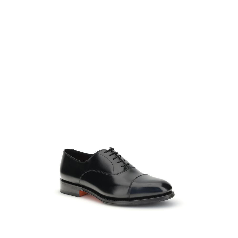 Santoni Black Calf Leather Bos Taurus Oxfords And Derbies with round toe and Goodyear construction.