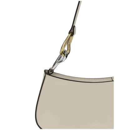 Close-up of Staud Cream Calf Leather Bos Taurus Shoulder Bag with distinctive double snap hook detail on the strap.