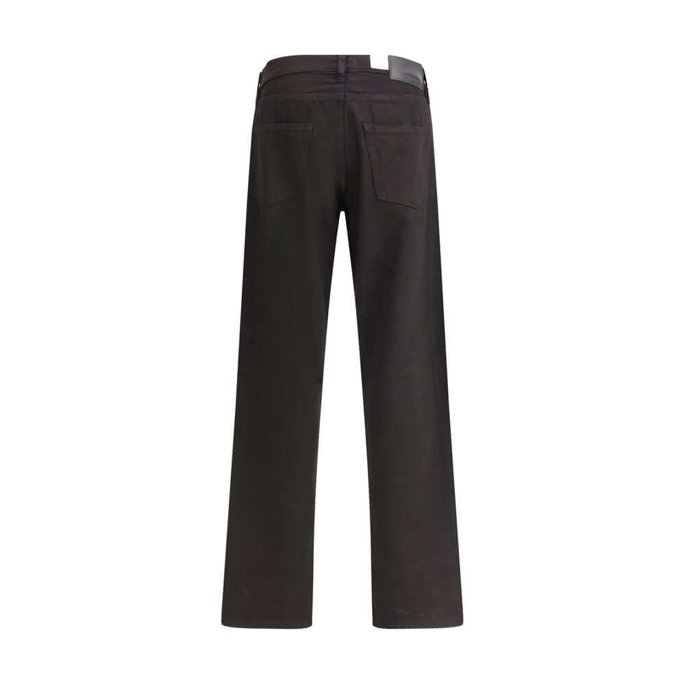 Back view of Sunflower Black Cotton Relaxed Fit Jeans with twisted leg seams and recycled metal trim.