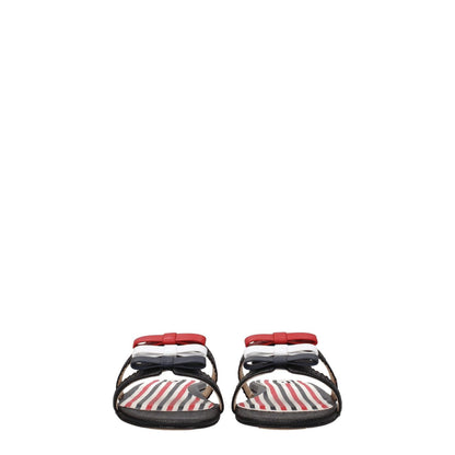 Thom Browne Black Leather Slippers with open toe, low flat heel, and striped insole detailing.