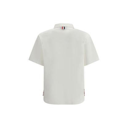 Back view of Thom Browne White Cotton Polo Shirt with signature embroidery and classic collar style.