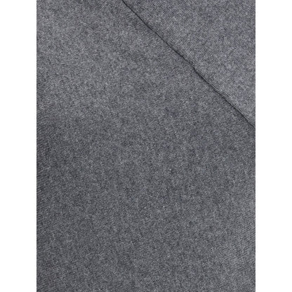 Close-up of Tom Ford Gray Cashmere Turtleneck fabric texture detailing elegance and quality.