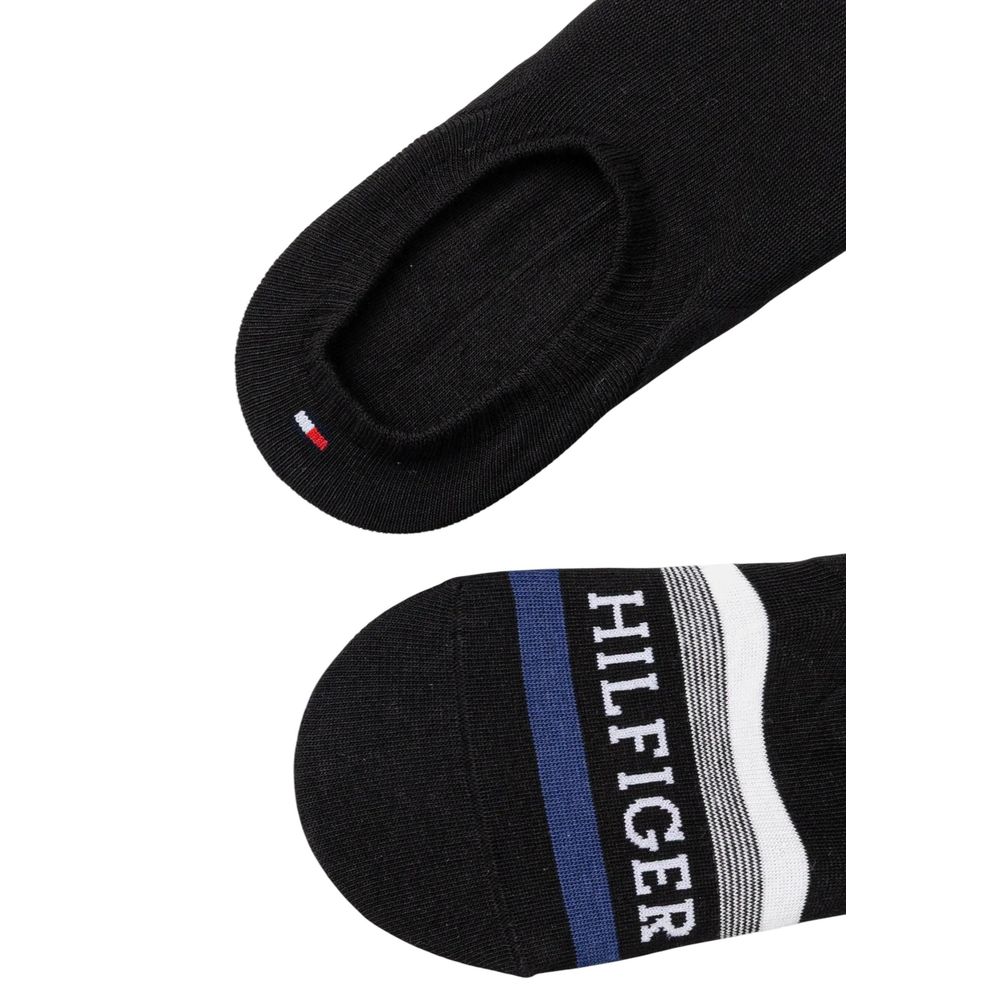 Tommy Hilfiger Black Cotton Socks with logo design, featuring breathable and durable fabric blend for a secure fit.