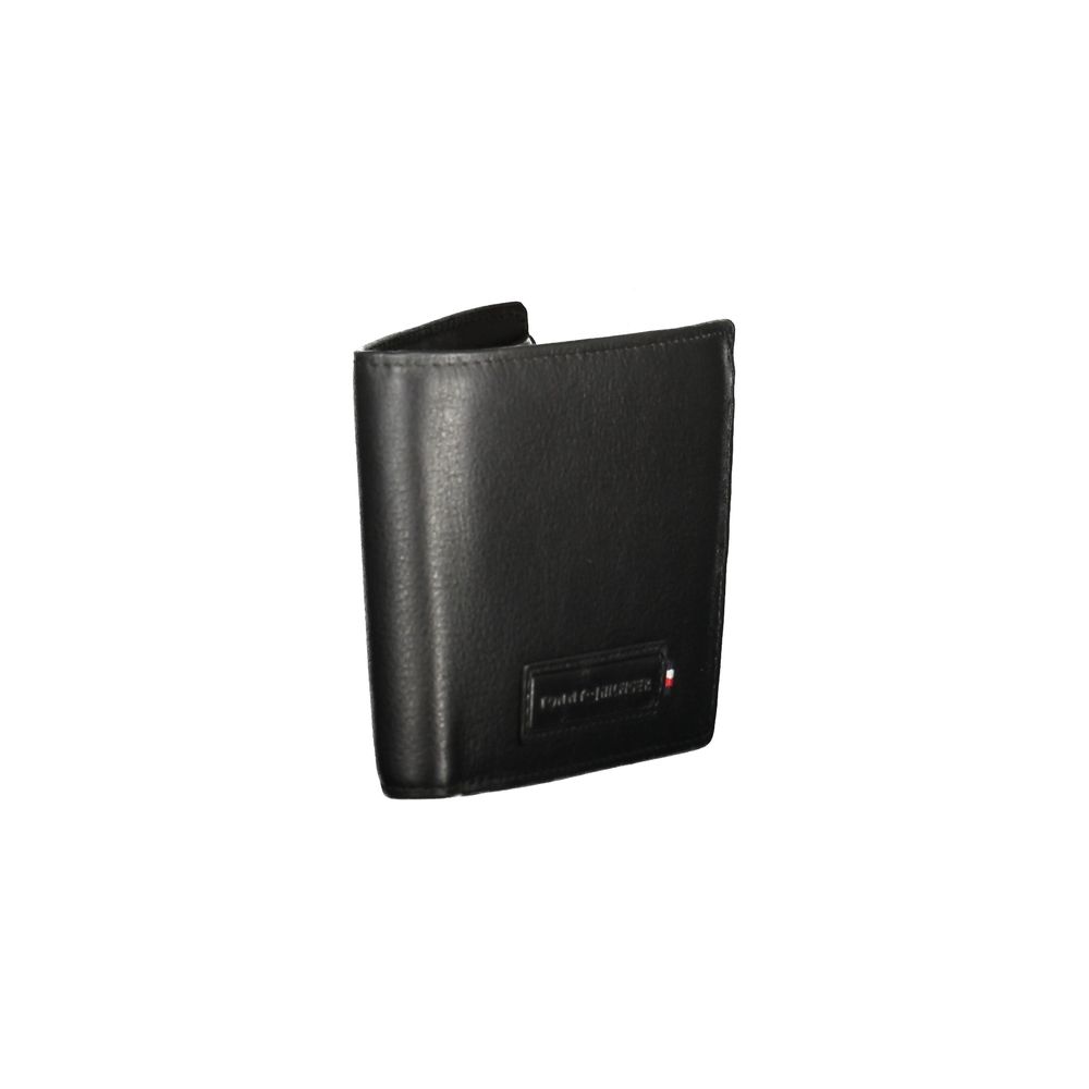 Tommy Hilfiger Black Leather Men Wallet with iconic logo and sleek design, featuring card slots and coin purse.