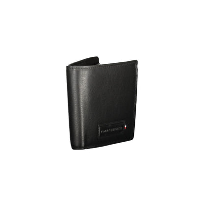 Tommy Hilfiger Black Leather Men Wallet with iconic logo and sleek design, featuring card slots and coin purse.
