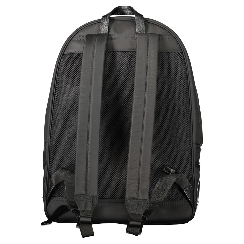 Back view of Tommy Hilfiger Black Polyester Backpack showing adjustable shoulder straps.