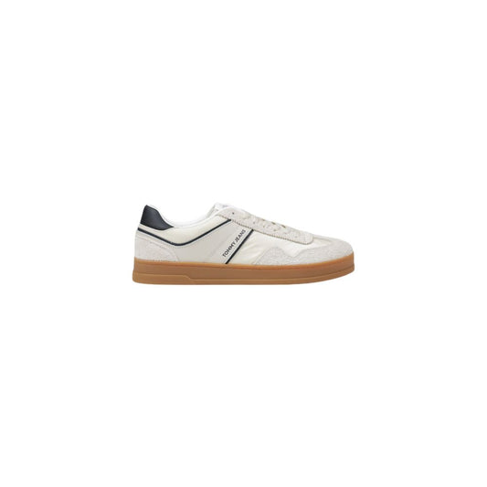Tommy Hilfiger Jeans Cream Leather Low Top Sneakers with branding, contrasting heel tab, and rubber sole for grip.