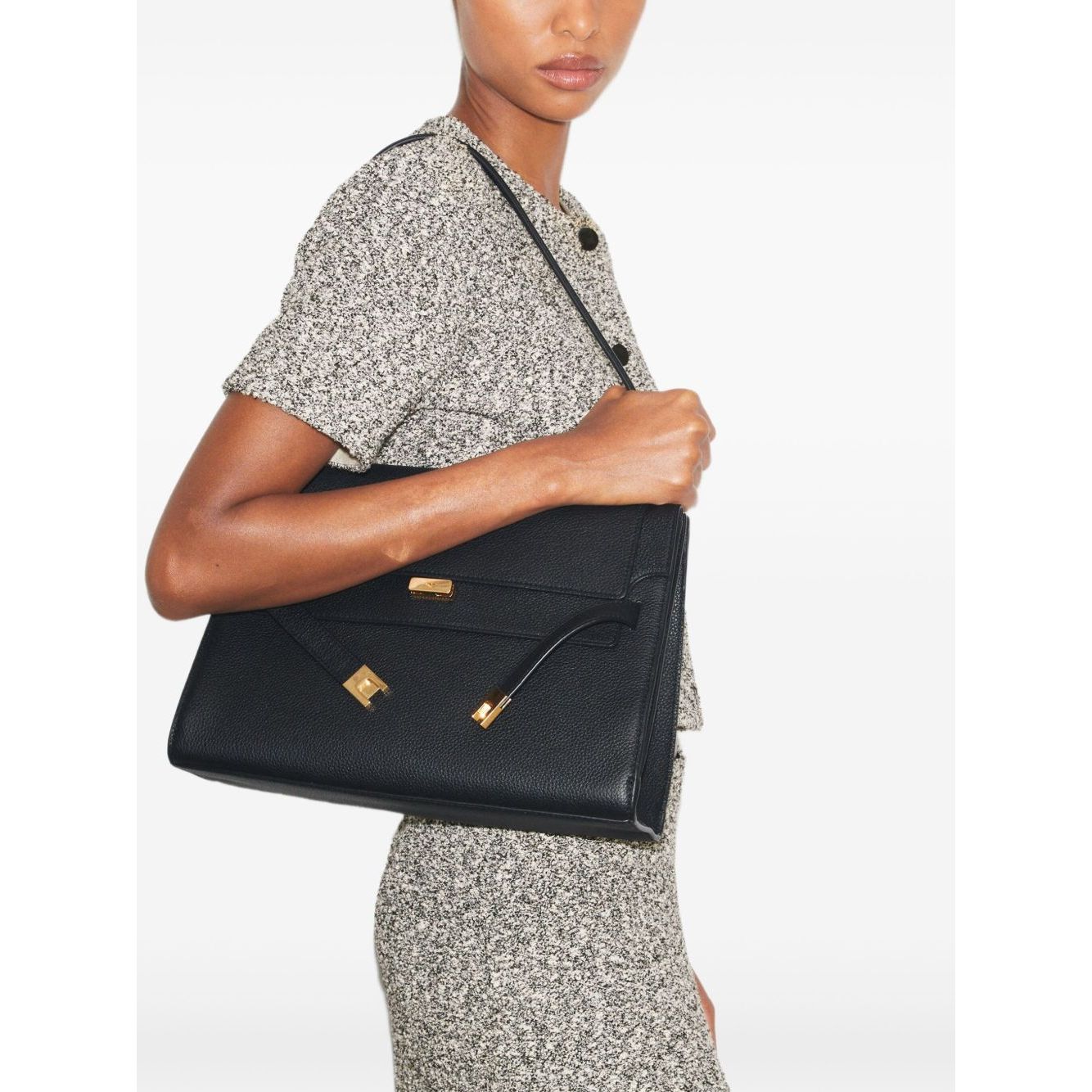 Front view with bag zipped and handles upright.