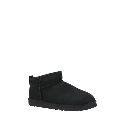 UGG Black Goatskin Ankle Boots with shearling lining and knurled sole.
