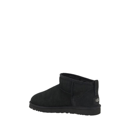 Alt Tag: UGG Black Goatskin Ankle Boots with knurled sole and shearling lining for comfort and warmth, featuring iconic monogram on heel.