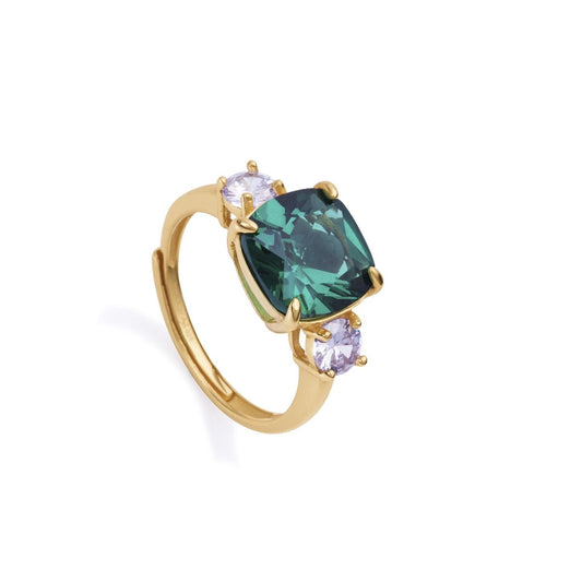 Gold ring with a large green gemstone and two smaller clear gems, showcasing an elegant design.